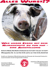 Das Plakat zur Aktion. Es enthält den Schriftzug "Alles Wurst?!", ein Portrait-Foto eines Hausschweins und organisatorische Angaben zur Ausstellung